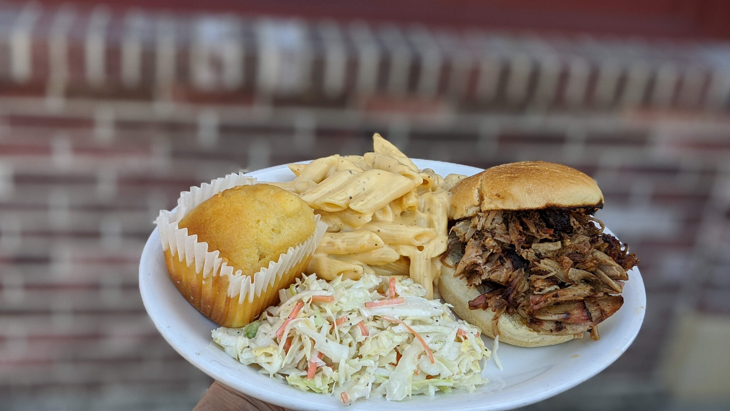 Fat Bob's Smokehouse signature dishes St. Louis Cut Ribs, Pulled Pork, Smoked Chicken Wings, Mac and Cheese